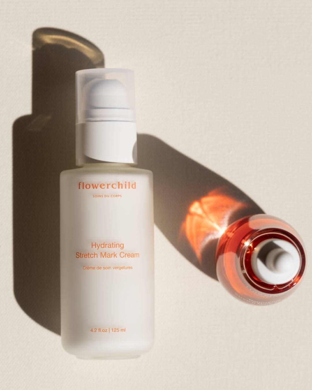 Duo anti-vergetures hydratants Flowerchild, crème sans parfum ou abricot yuzu, peau sensible et prévention vergetures grossesse.