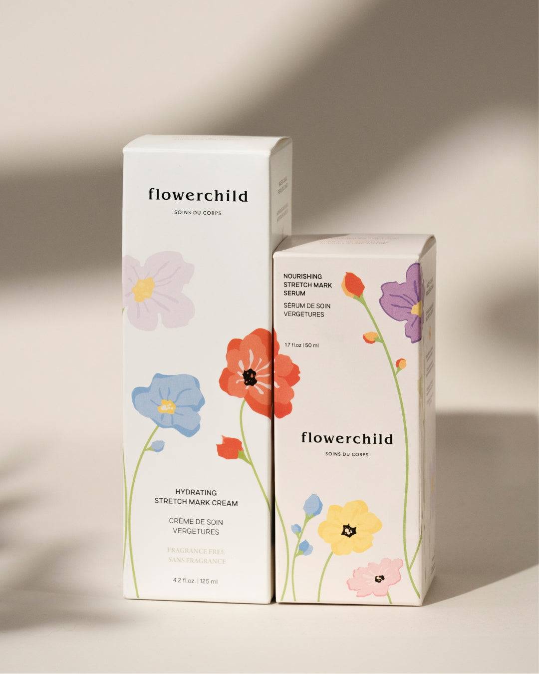Duo anti-vergetures Flowerchild, soins grossesse sans parfum ou abricot yuzu, emballage floral élégant.