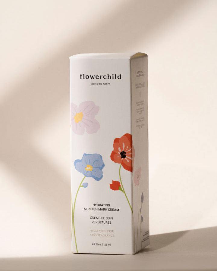 Crème anti-vergetures grossesse Flowerchild, soin hydratant naturel aux extraits botaniques et Croton lechleri, emballage floral élégant.